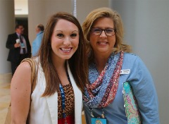 Percival with CoSIDA Director of Membership Engagement Laurie Bollig during the 2019 convention in Orlando.